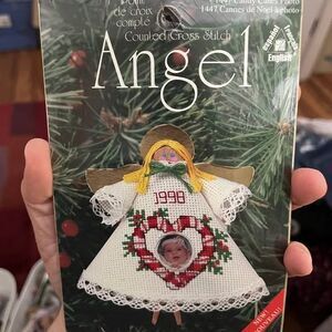Designs for the Needle Counted Cross Stitch Angel 1447 Candy Canes Photo